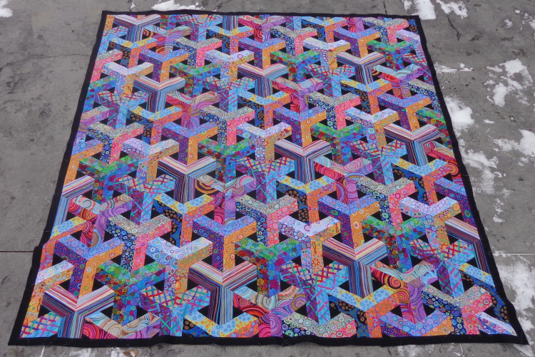 Escher quilt from kit pieced by Deborah Cooke