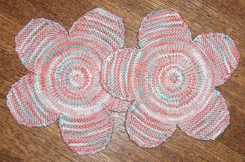 Reverse-Bloom Flower Washcloth by Cindy Taylor knit in mystery yarn by Deborah Cooke