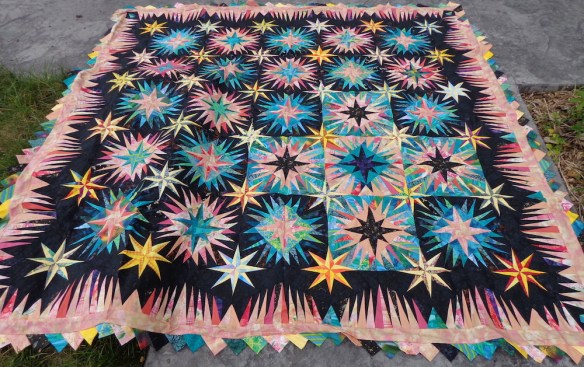 Jumping Jack Flash quilt by Judy Neidemeyer pieced by Deborah Cooke
