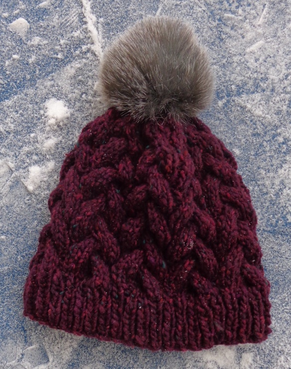 First Snow hat pattern knit by Deborah Cooke in a mystery tweed mill end