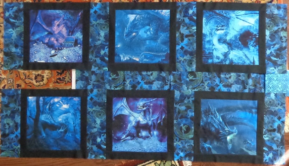 In the Beginning Dragon quilt panels pieced by Deborah Cooke