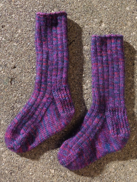 Purple snowshoe socks knit by Deborah Cooke