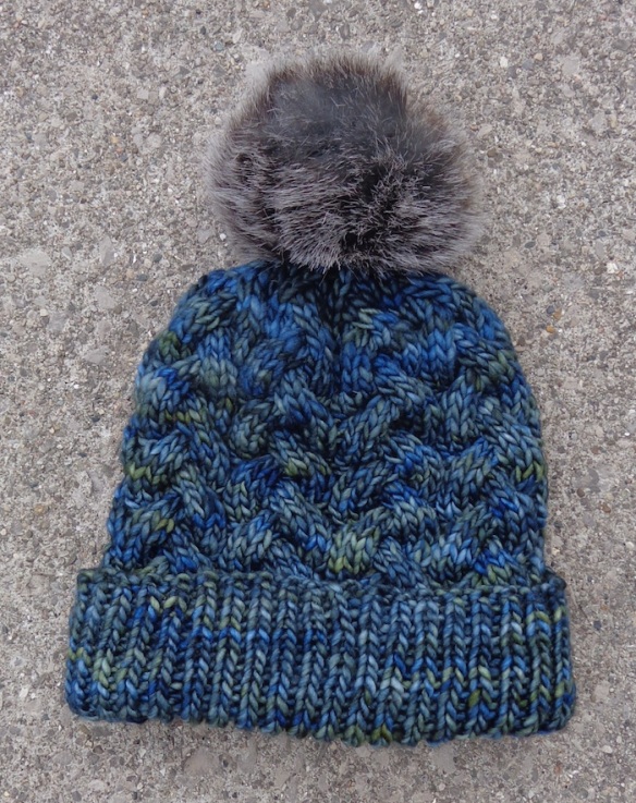 Hat of Malabrigo Worsted in First Snow pattern knit by Deborah Cooke