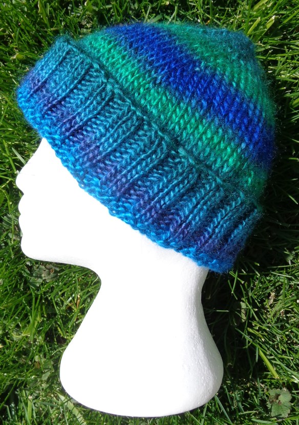 Chemo Hat in Aran weight yarn by Deborah Cooke, knit in Lion Brand Landscapes by Deborah Cooke