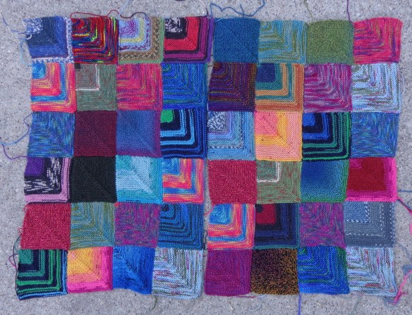 Mitred sock yarn squares afghan knit by Deborah Cooke