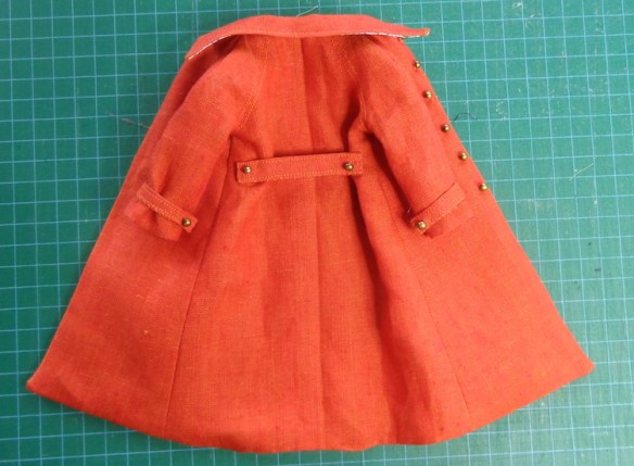 Trench Setting coat designed by Hankie Chic for Silkstone Barbie, sewn in orange shot linen by Deborah Cooke