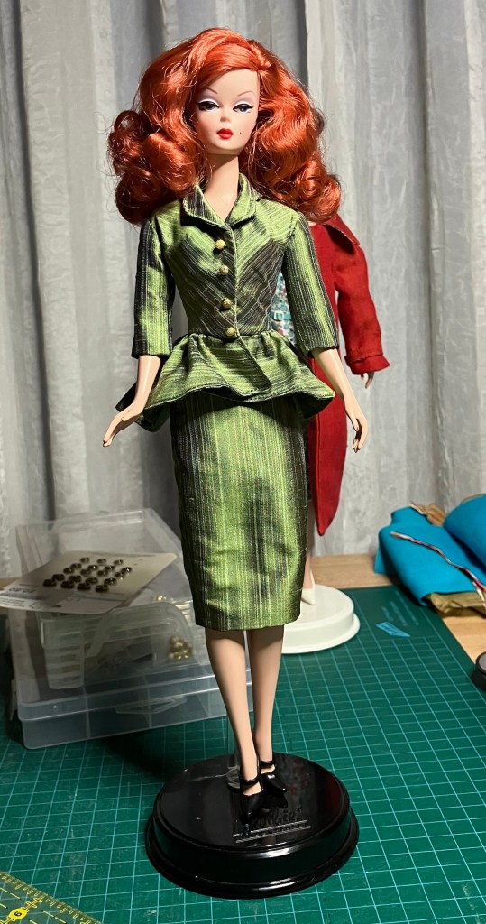 Phoebe by Hankie Chic sewn in green striped silk by Deborah Cooke