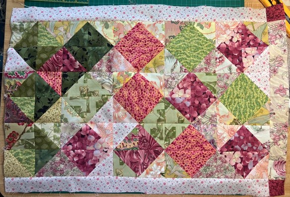 leftovers from the Lady of the Lake quilt, pieced together for a mini quilt by Deborah Cooke