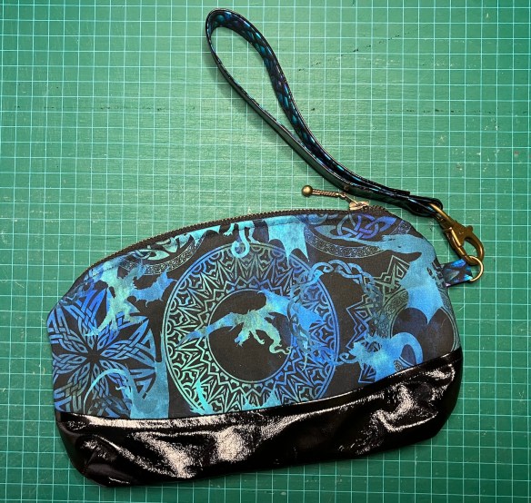 Clematis wristlet by Blue Calla patterns sewn by Deborah Cooke