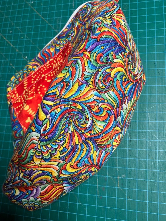 Orange purse from Elegant Edibles Knitpicks kit, knit by Deborah Cooke - lining and reinforcement of base