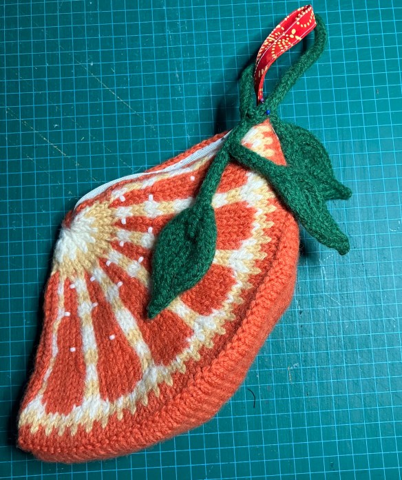 Orange purse from Elegant Edibles Knitpicks kit, knit by Deborah Cooke - completed purse