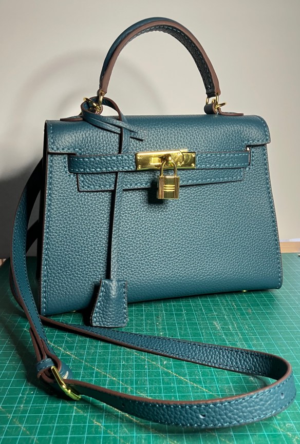 medium kelly bag from Babylon leather in peacock blue made by Deborah Cooke